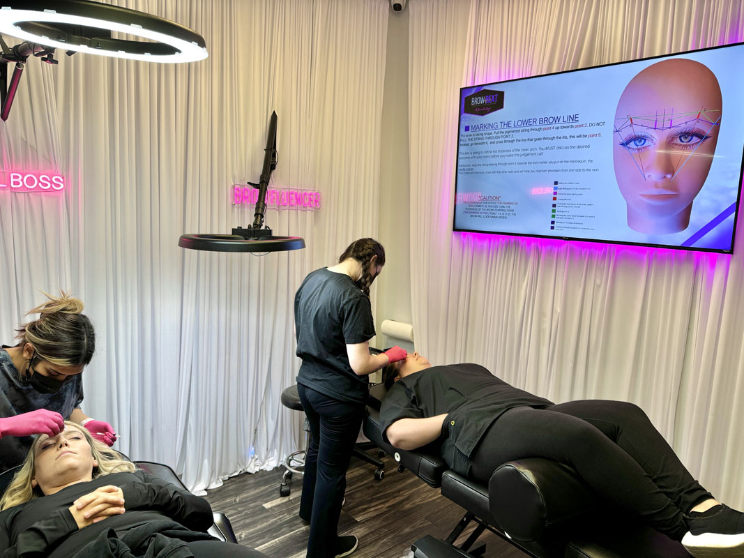 Classroom focused on learning milestones and personal growth Final classroom sessions focused on perfecting PMU artistry