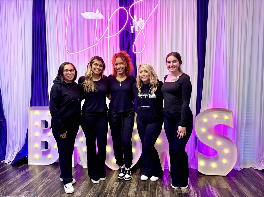 Student holding certificate after completing hands-on training Hands-on training certification
