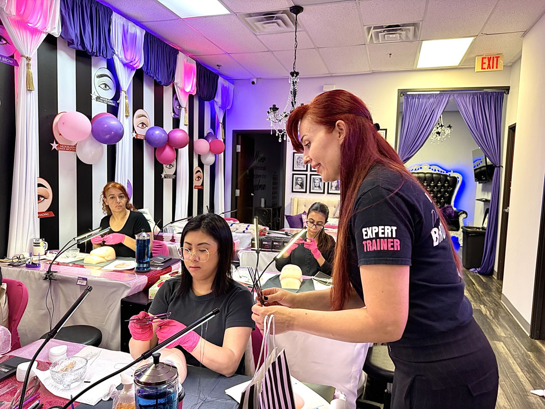 Students learning microblading and semi-permanent makeup training at BrowBeat Studio™ Dallas