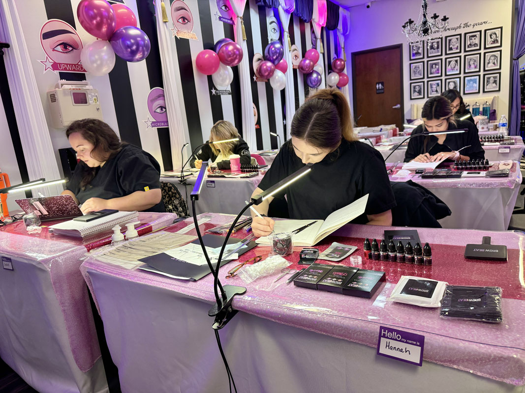 Student practicing ombré shading with machine Dallas class