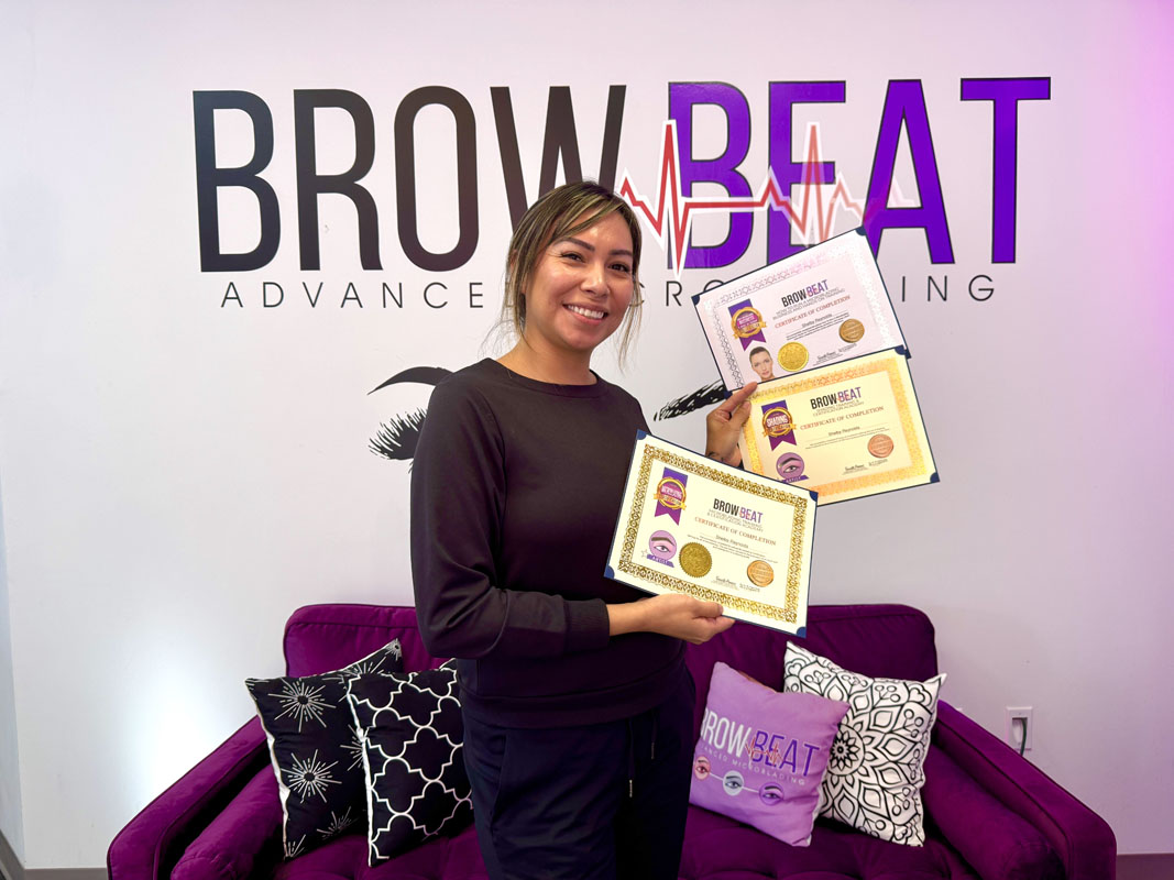 Happy student after completing brow training class Beginner smiling after finishing certification course