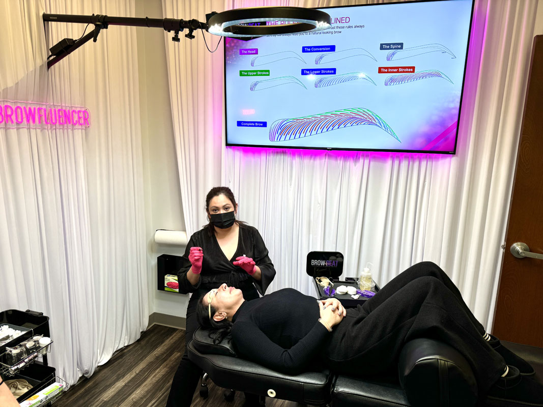 Classroom training included in microblading certification cost in Texas Students learning microblading techniques in Texas certification classroom