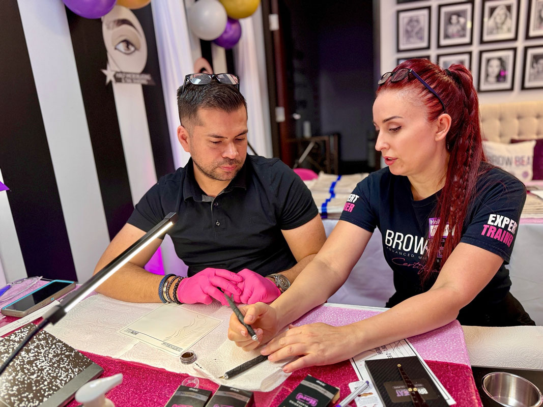 student-practice-microblading-dallas Student practicing microblading strokes in Dallas class