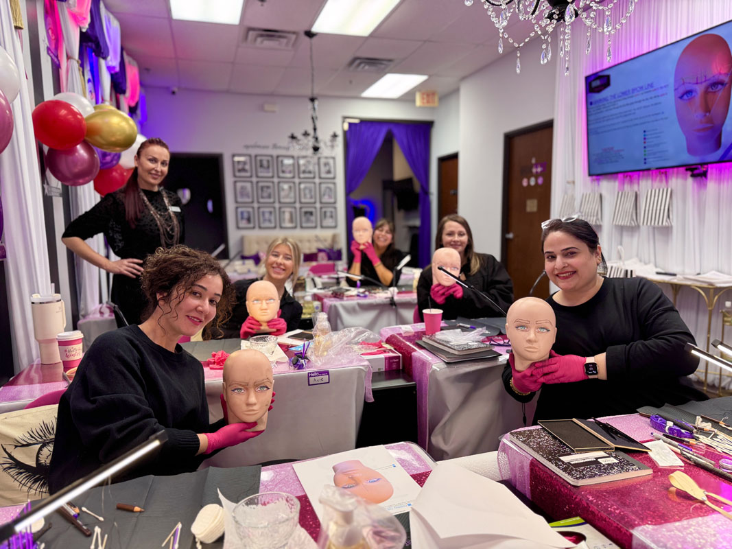 Student mapping brows before ombre shading during powder brow training